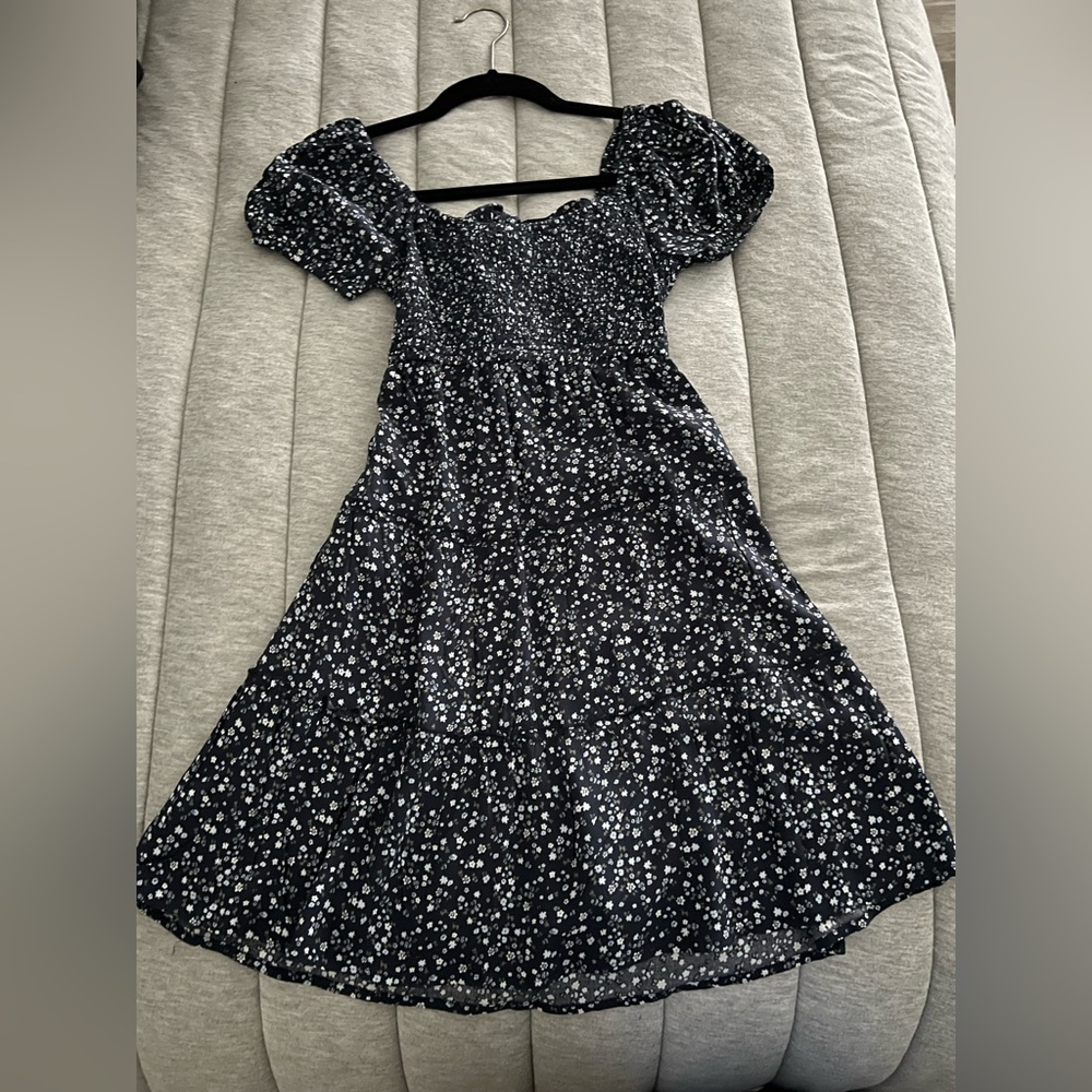 holister blue summer mini dress, white flower details, open back with a tie